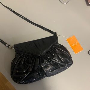 NEVER USED Latico Leather small clutch with strap